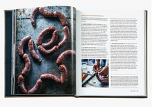 Load image into Gallery viewer, The Meateater Fish and Game Leather Bound Cookbook
